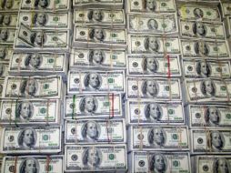 Personal aduanal puso a disposición del Agente del Ministerio Público de la Federación el dinero y al conductor del tracto camión. ARCHIVO /