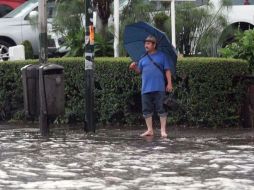 El SMN informó que el fenómeno provocará lluvias intensas en Michoacán, Guerrero, Jalisco y Colima. ARCHIVO /