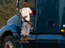 Presuntos miembros del crimen organizado habrían 'echado de cabeza' a los uniformados. ARCHIVO /