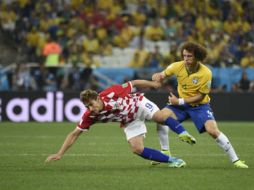El defensa brasileño, David Luiz, se posiciona en el líderato del ránking del índice Castrol del Mundial. AFP /