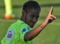 'No estamos aquí para dar espectáculo. Estamos aquí para correr hasta  el final y salir vencedores', afirma Neymar. AFP /