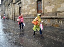 Lluvia en el centro de la ciudad.  /