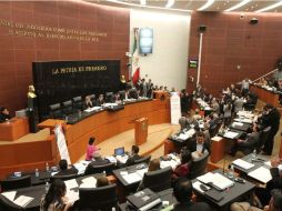 Raúl Cervantes Andrade cierra la sesión extraordinaria en la que se discutió y votó el dictamen de las leyes secundarias. ARCHIVO /