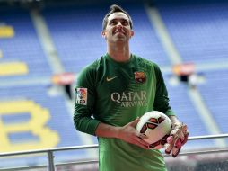 El portero de 31 años ya estuvo en Camp Nou tras una destacada participación en el Mundial. AFP /