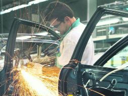Al alza. La industria automotriz mexicana podría producir un récord de 3.1 millones de unidades en 2014. AFP /