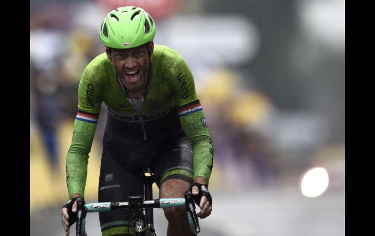 Boom celebra cuando cruza la línea final. AFP /