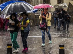 Debido a la onda tropical número 13, las lluvias persistirán en Jalisco. ARCHIVO /