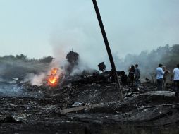 El avión siniestrado se dirigía a Kuala Lumpur con 295 personas a bordo. AFP /