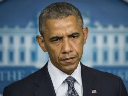 ''Es necesario que todas las partes se adhieran a un alto el fuego inmediato'', dice Obama en relación a Ucrania. AFP /