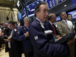 Las ganancias de Google, Honeywell y otras empresas de EU impulsan las acciones en la bolsa. AP /