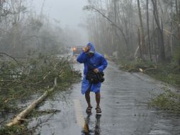 El tifón causó estragos en Filipinas, donde dejó 77 muertos. AFP /