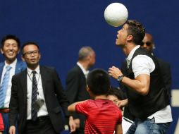 Esta es una de las postales de CR7 en su visita por Asia. AFP /