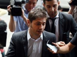 El ministro de economía de Argentina llega a las oficinas del mediador Daniel A. Pollack. AFP /