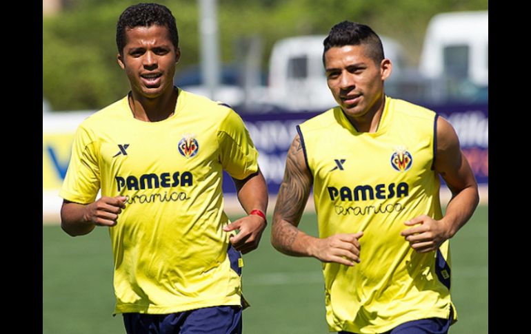 Giovani (d) y Javier ya se incorporaron a los trabajos del equipo español. ESPECIAL /