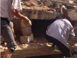 Los residentes se unen a la búsqueda por sobrevivientes en la provincia de Yunnan. AFP /