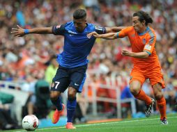 Andrés aprovechó la mala pasada del arquero rival para marcar el último gol del juego. AFP /