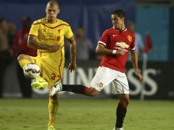 Manchester estuvo a punto de abrir el marcador, cuando un centro al área no pudo ser conectado por 'Chicharito' Hernández. AP /