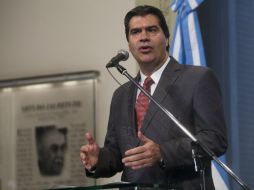 El jefe de ministros, Jorge Capitanich, habla sobre el fallo a favor de Griesa sobre los fondos especulativos de Argentina en EU. EFE /
