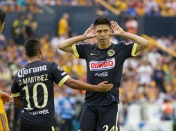 Oribe Peralta festeja la anotación que abrió el marcador a favor de las Águilas.  /