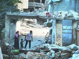 El domingo se pactó una tregua de 72 horas para que la comunidad en la Franja de Gaza pudiera abastecerse de alimentos. AFP /