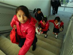 La Profeco indica que es importante elegir la talla correcta de los uniformes y considerar el crecimiento de los hijos. ARCHIVO /