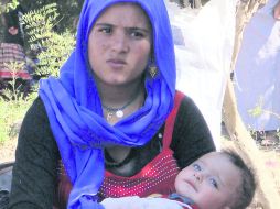 Refugiados yazidíes en el campo de Janek, abandonan sus casas en el Norte de Iraq para huir del horror creado por los yihadistas. EFE /