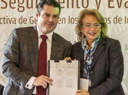 El gobernador Aristóteles Sandoval y Olga María del Carmen Sánchez, magistrada de la SCJN.  /