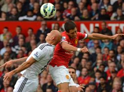 El delantero mexicano juega en los primeros 45 minutos del encuentro, sin concretar el gol. AFP /
