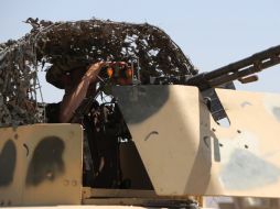 Las tropas kurdas vigilan la zona de Bashiqa en un intento de recuperar la presa Mosul, Iraq. AFP /