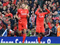 Sin dos de sus flamantes refuerzos, Liverpool logró sacar la victoria. AFP /