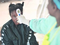 En riesgo. Autoridades sanitarias habían manifestado su intención de poner en cuarentena el barrio donde ocurrieron los saqueos. AFP /