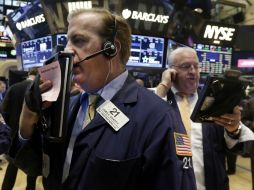 Las alzas se animaron por los buenos datos del mercado de viviendas y en espera de la publicación de minutas de la Fed. AP /