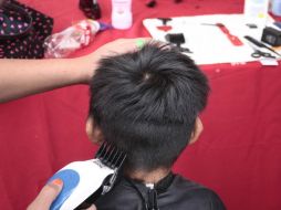 El director de la escuela dice que los padres acordaron que niños sin cabello corto serían intervenidos. Su sobrina realizó los cortes. ARCHIVO /