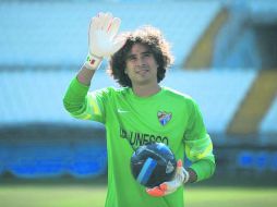 Aunque no está confirmado como titular, el arquero tapatío fue convocado en el Málaga para recibir al Athletic de Bilbao. AFP /