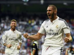 Benzema abrió el marcador para el equipo campeón de la Champions League. AP /