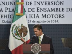 Enrique Peña Nieto, durante el anuncio de la construcción de una planta de Kia Motors Corp. en México. AFP /