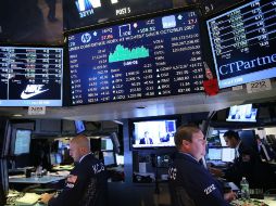 La Bolsa de Valores de Estados Unidos cerró con pocas perdidas comparada a días pasados. AFP /