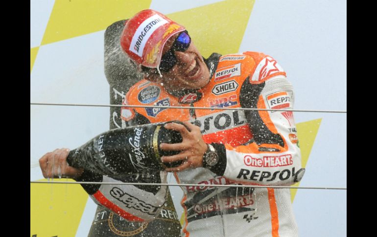 A dos vueltas del final, Márquez lanzó el ataque definitivo y se impuso con 732 milésimas de ventaja. AP /