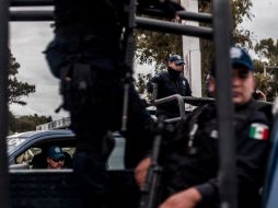 Los policías aseguran que continuarán con las manifestaciones de no solucionar sus peticiones. ARCHIVO /