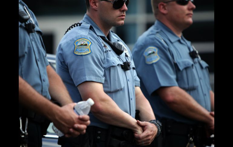 El fin de semana pasado, más de mil manifestantes marcharon nuevamente en Ferguson por el asesinato de Michael Brown. AP /