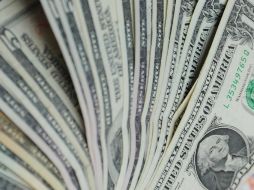 El peso inicia con una apreciación de 0.23 por ciento para cotizarse en alrededor de 13.07 unidades por dólar. ARCHIVO /