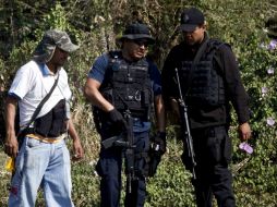 Despliegan unidades terrestres y un helicóptero para apoyar a la Policía Estatal Preventiva. ARCHIVO /