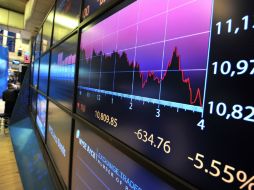 El Dow Jones y el selectivo S&P 500 tienen pérdidas. AFP  ARCHIVO  /