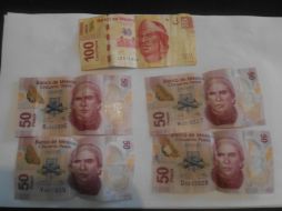 Según los oficiales, a un presunto ladrón se le encontraron 300 pesos de los mil que le robaron al chofer. EL INFORMADOR  /