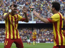 Con jugadas posibilitadas por el delantero argentino, Messi, el brasileño anota y da la victoria a los blaugranas. EFE  A. Dalmau  /