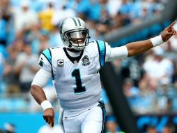 Cam Newton tuvo un retorno exitoso a la NFL, al lanzar para 281 yardas y una anotación. AFP  S. Lecka.  /