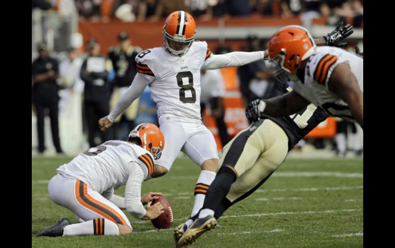 Billy Cundiff (c) consiguió un gol de campo de 29 yardas a tres segundos del final. AP  T. Dejak.  /