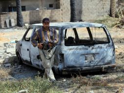 La policía dijo que obuses lanzados contra viviendas causaron el fallecimiento de tres personas. AFP A. AL-RUBAYE..  /