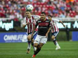 Acción de juego entre Xolos y Chivas en la Llave 3 de la Copa Mx. MEXSPORT  J. Díaz  /