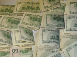 El tipo de cambio puede oscilar en un rango de 13.13 y 13.22 pesos por dólar. EL INFORMADOR ARCHIVO /